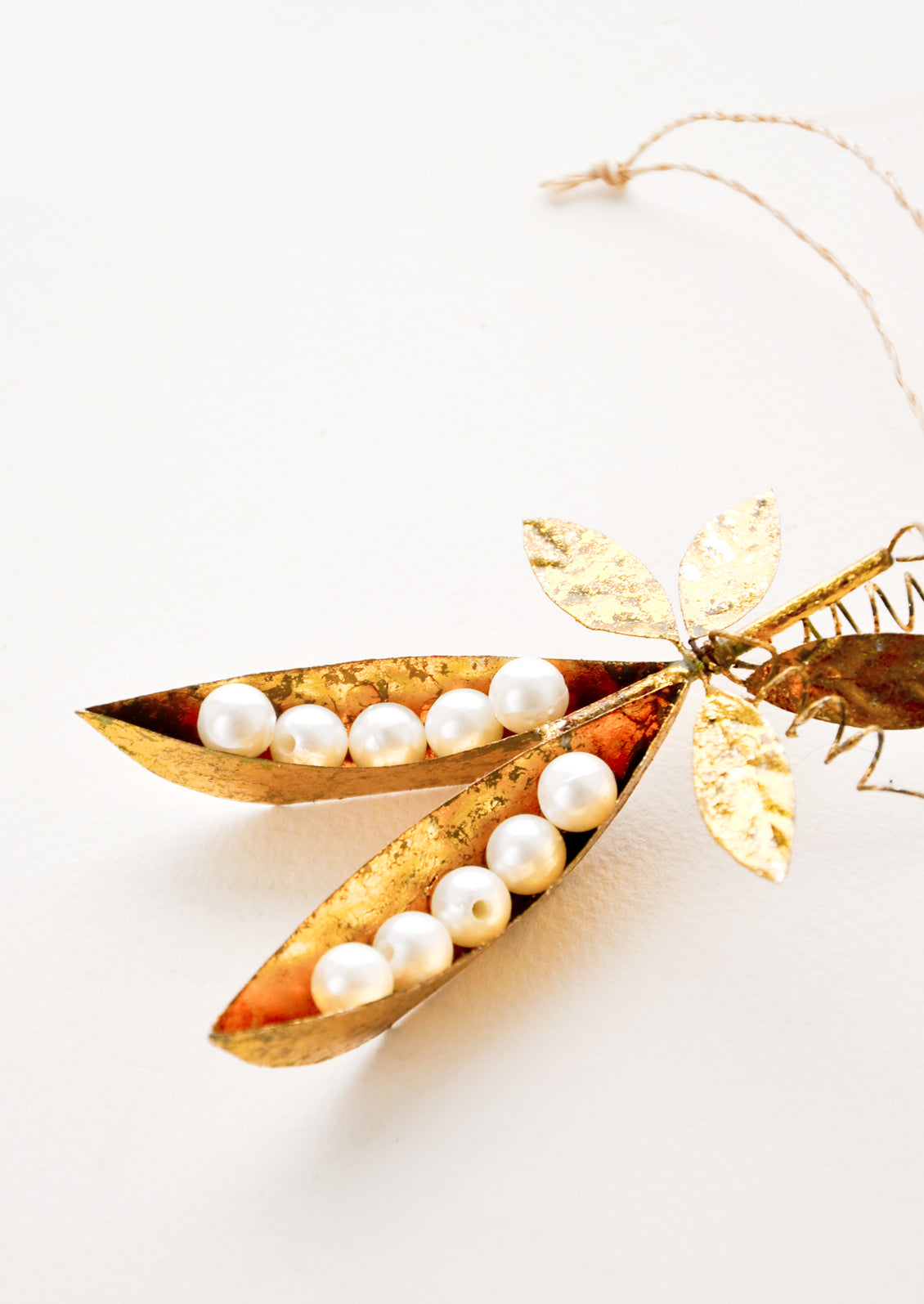 Gilded Snow Pea Ornament in - LEIF