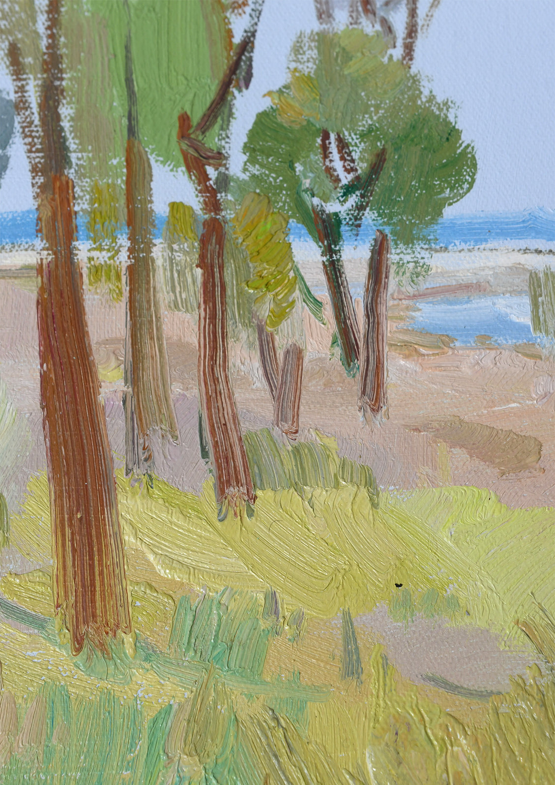 Impressionistic landscape painting of trees with brown trunks and green foliage, set against a pale blue sky and sandy beige ground with visible brushstrokes.