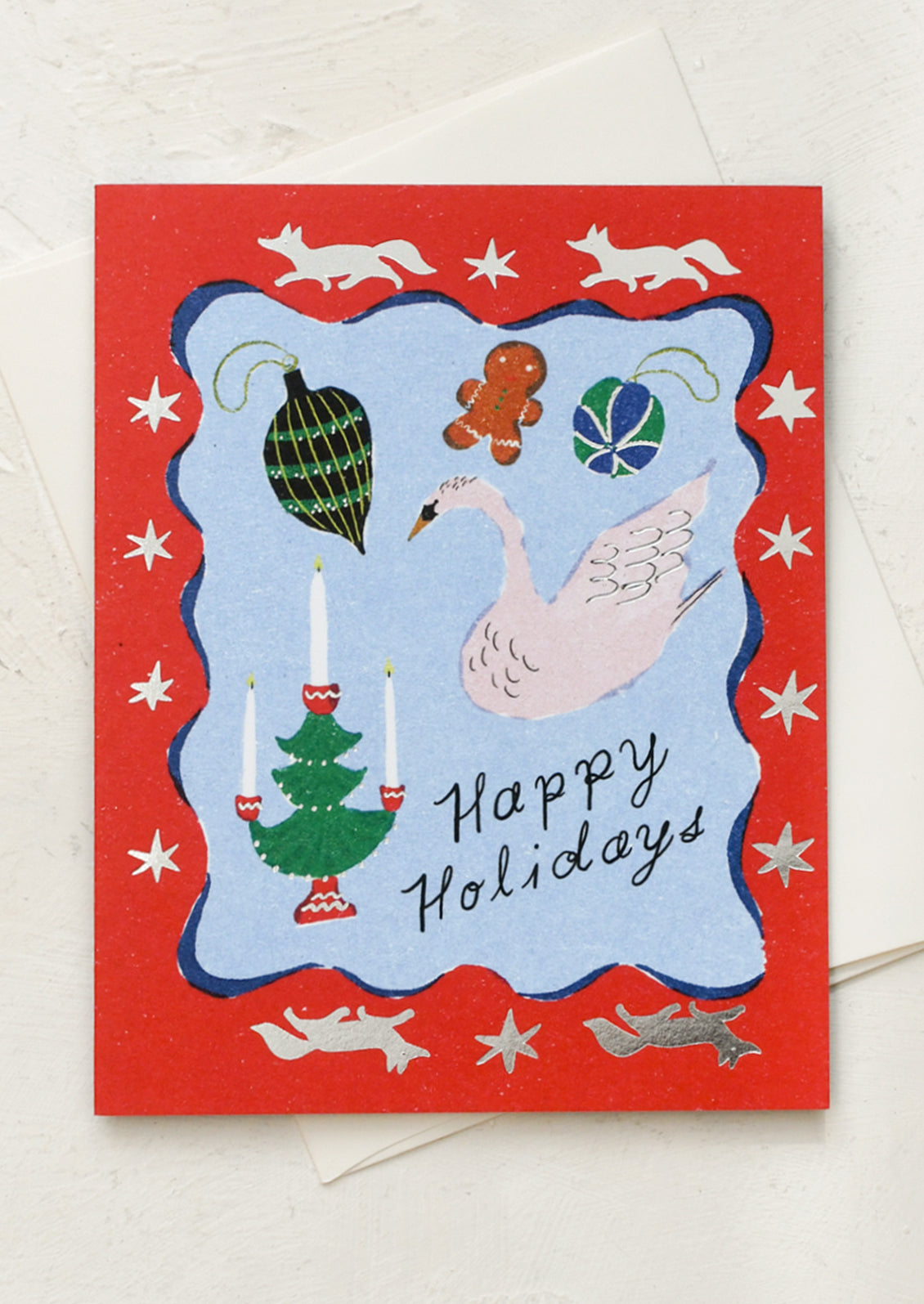 A holiday greeting card with illustrated design, text reads "Happy Holidays".