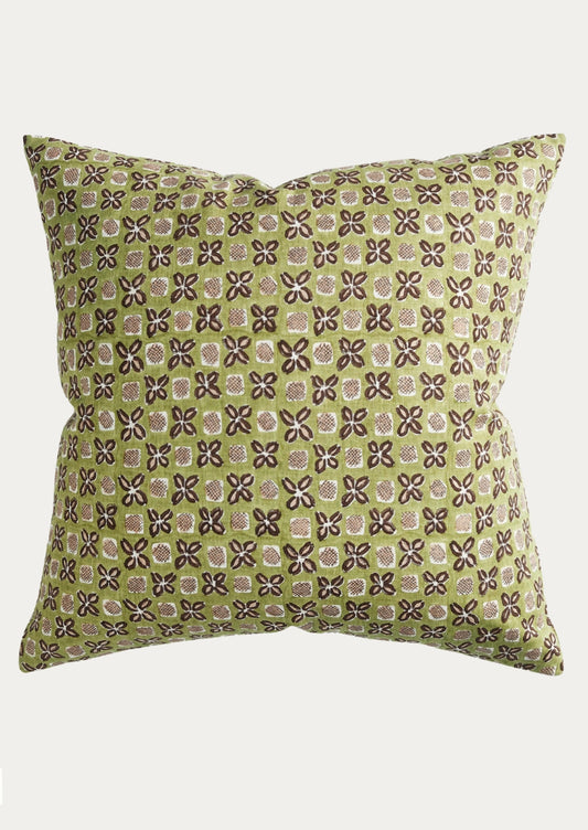 A square decorative throw pillow featuring a repeating floral block-print pattern in olive green, brown, and beige on a light gray background.