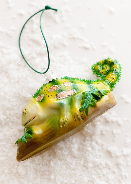 A glass ornament of a chameleon.