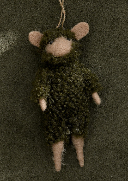 A felted animal ornament wearing fuzzy green fleece onesie.