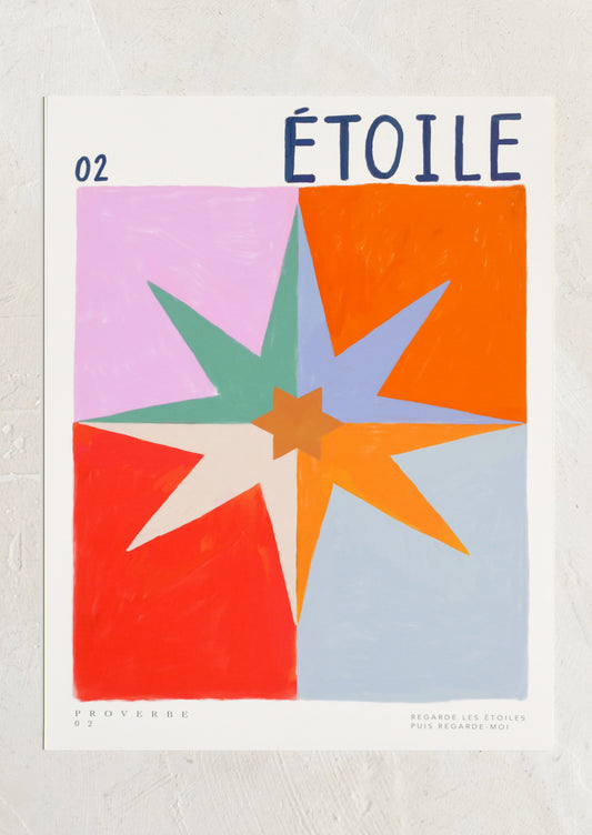 Colorful star design with 'étoile' text on a textured background
