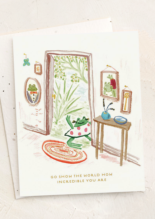 Greeting card with a frog character in a room, surrounded by nature-themed illustrations.