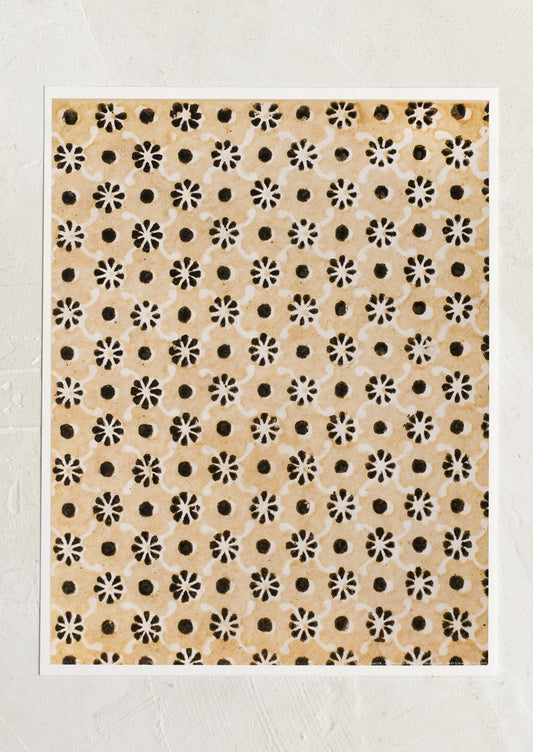 An art print that looks like a block printed textile in beige and black flower pattern.