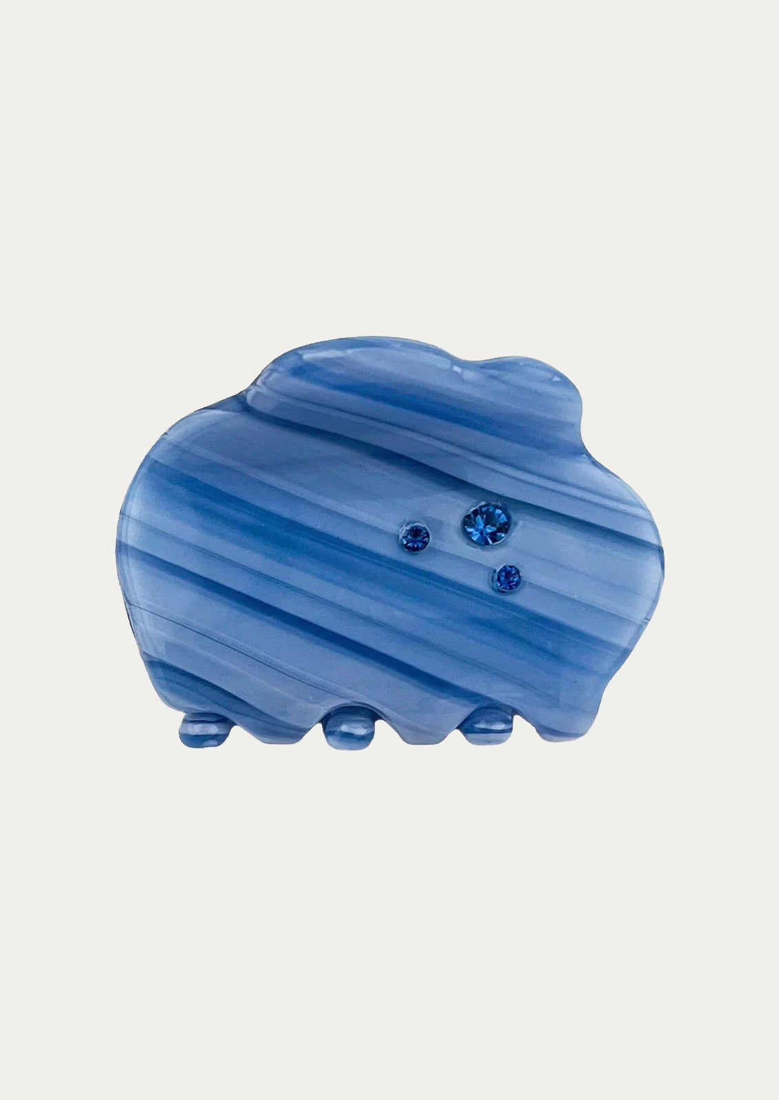A marbled blue cloud-shaped hair claw adorned with 3 tiny blue jewels.