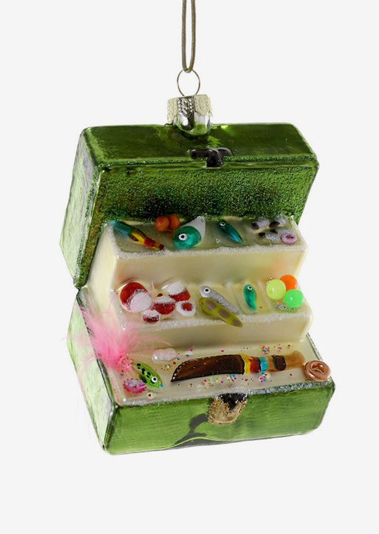 A holiday ornament of a fishing tackle box with fishing supplies.