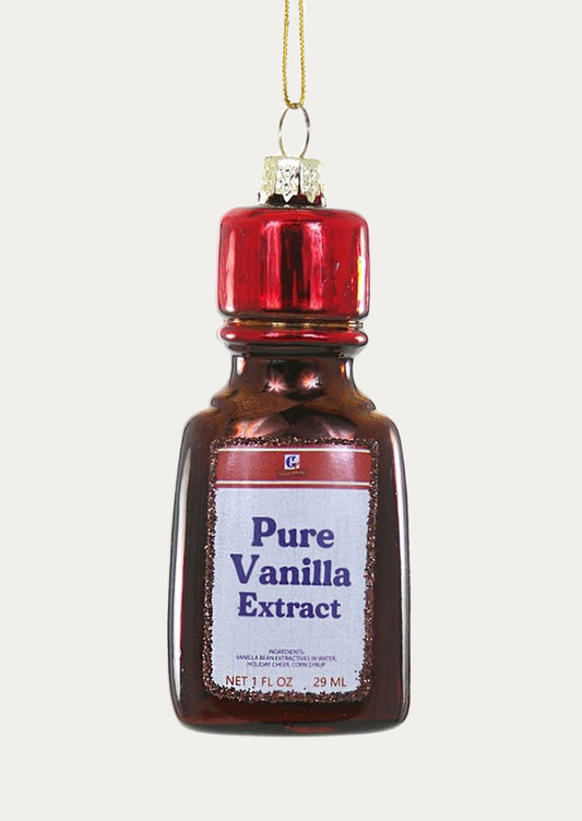 Decorative ornament shaped like a bottle of pure vanilla extract on a white background