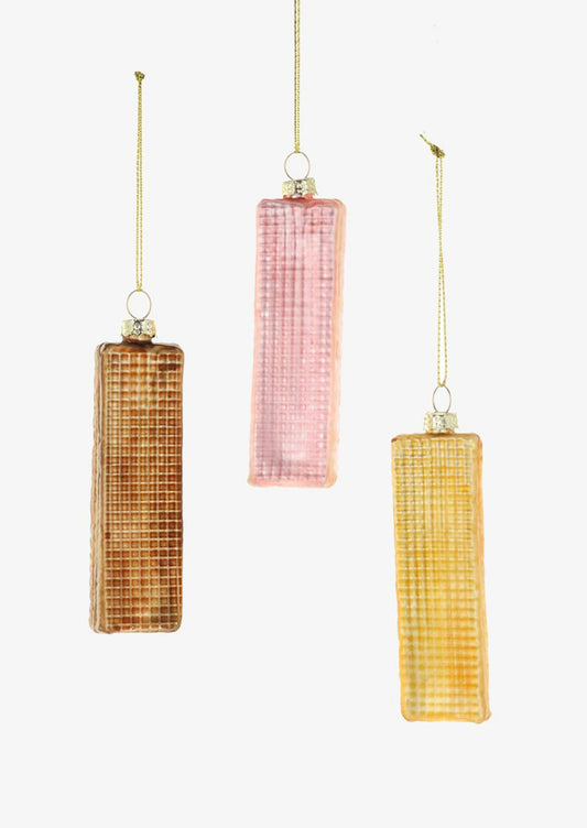 Glass ornaments of wafer cookies in chocolate, strawberry and vanilla colors.