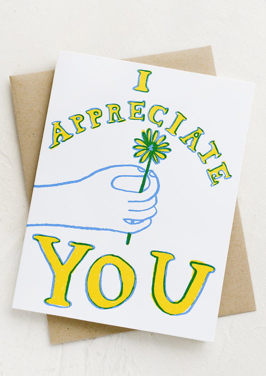 Card with image of a hand offering a flower, text reads "I Appreciate you".