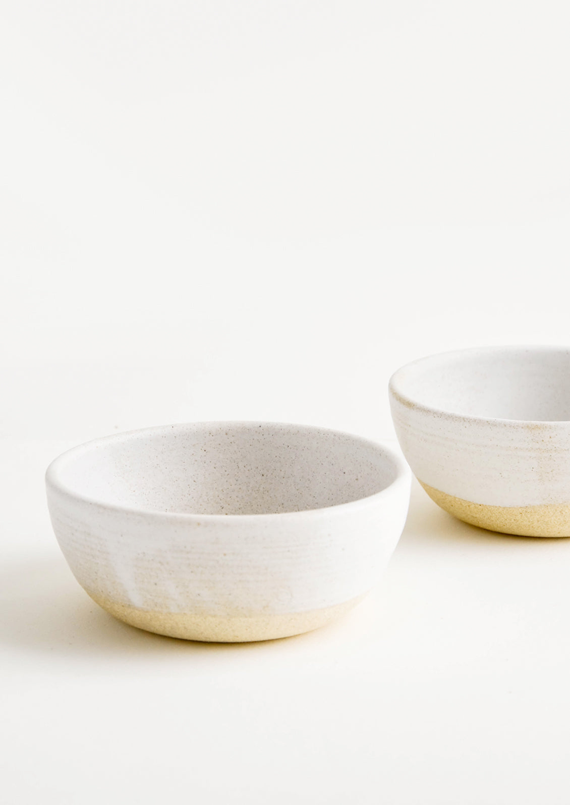 Two white ceramic bowls.