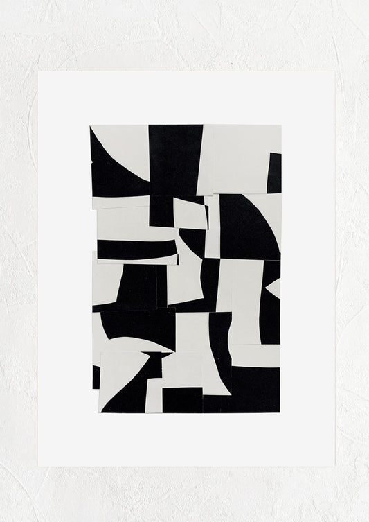 A black and white abstract art print with pieces of paper layered together.