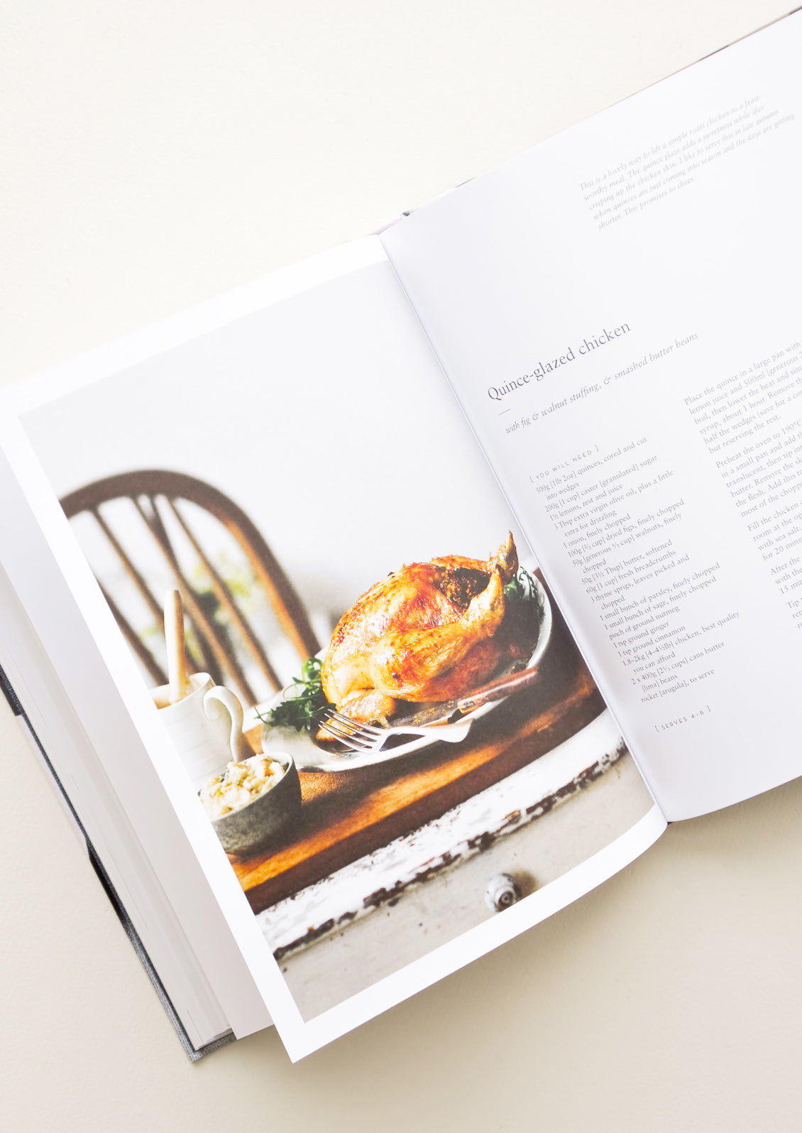 A cookbook opened to a recipe for glazed chicken.