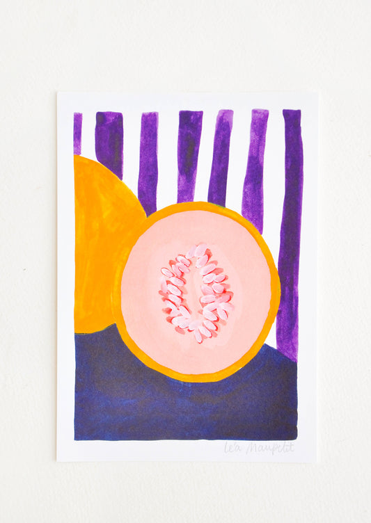 Still life of a cut cantaloup against a backdrop of purple and white vertical stripes.