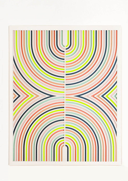 Lasercut artwork featuring mirrored half-arcs in a neon color palette